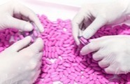 gloved-GMP-operators-removing-tablets-from-blisters-186x120